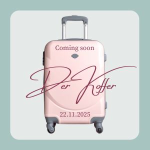 Rosa Rollkoffer mit Aufschrift: Coming soon. Der Koffer. 22.11.2025